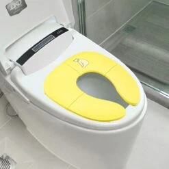 Kinder WC (geel) Bril Opvouwbaar Licht Ontwerp Hygiënisch Voor Onderweg WC Bril Voor Zindelijkheidstraining Makkelijk Mee Te Nemen Gratis Tasje Bijgeleverd -Babyproducten Korting 1200x1200 1429